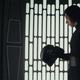 After being taunted by Snoke about his mask—the visage of his grandfather reborn—Kylo Ren prepares to smash it to pieces in a rage. How symbolic!